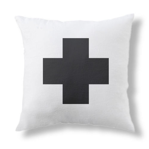 Pillow with croos sign on it
